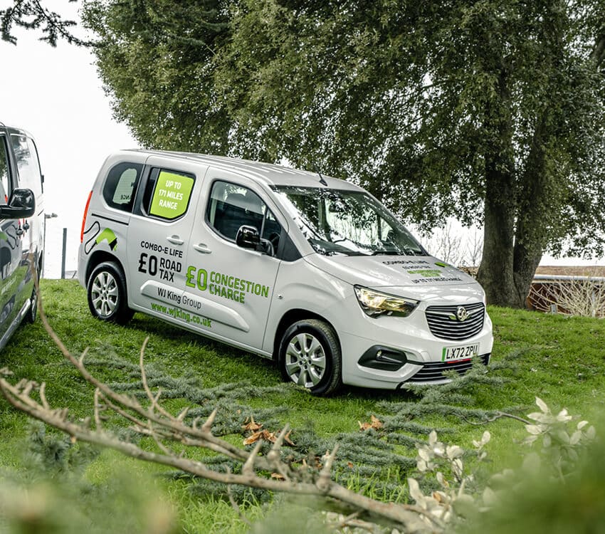 Small van outside on grass