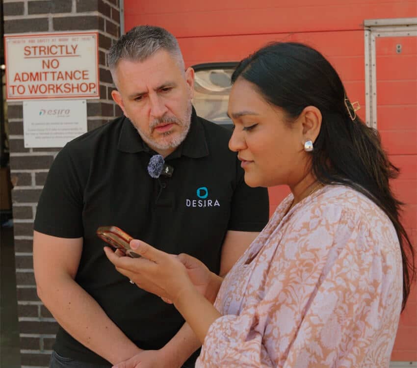 A woman helping a client with social media management